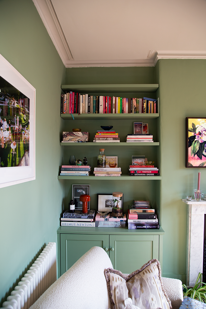 Wide Necked Tinyjohns Are Perfect housewarming gifts and can fit into any corner of your home like these bookshelves. 